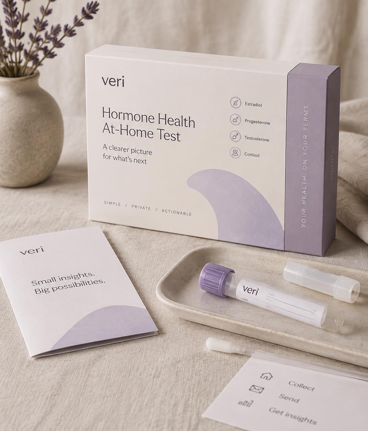 At-home hormone testing kit with collection tubes and instructions
